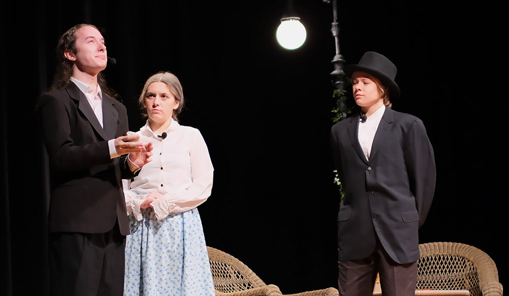 Left to right: Zachary Moran, Ava Todisco, Timber Jackson
Jack Worthing breaks the news to Miss Prism and Dr. Chausable that his (fictional) brother has died